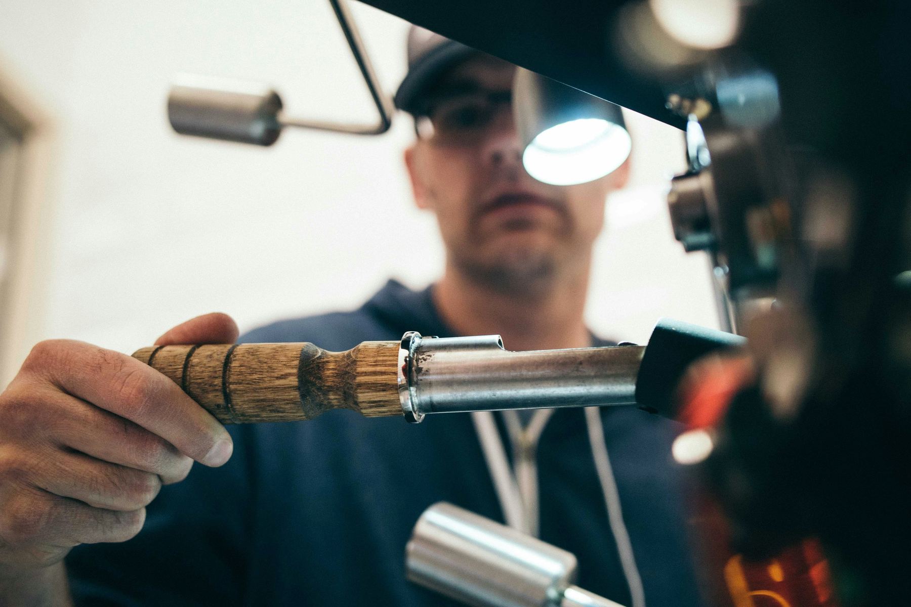 Plumber working on pipework in a Glasgow home